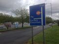 A large blue motorway sign.